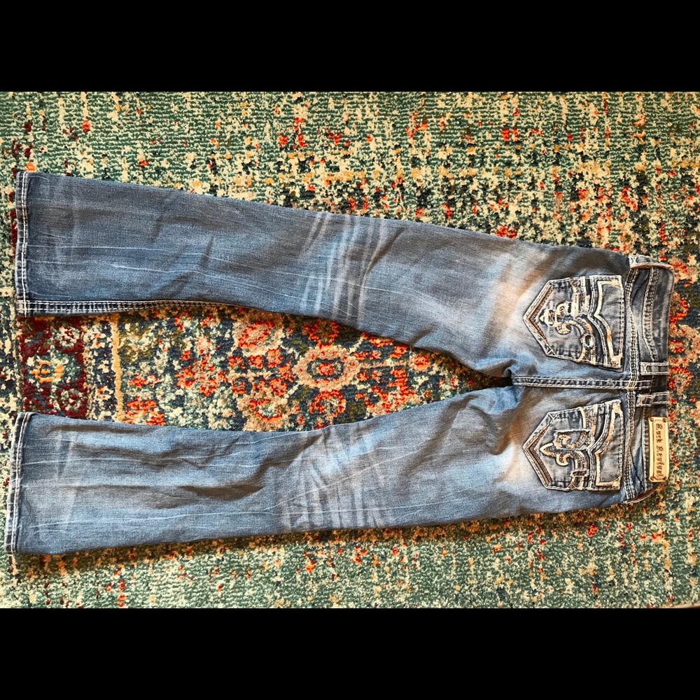 Women’s Rock Revival boot-cut jeans